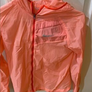 Nike size small peach running jacket